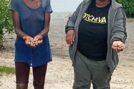 Fernanda Samuel and a local fisher