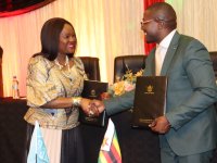 COP Signing Host Country Agreement.png