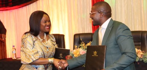 COP Signing Host Country Agreement.png