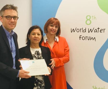 Danone Global Nature and Climate Director Eric Soubeiran, Water Resources and Nature Director Muriel Jaujou, and Maria Rivera, Senior Advisor for the Americas Ramsar Convention Secretariat